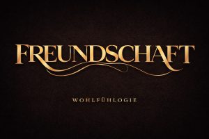 goldener Schriftzug: FREUNDSCHAFT auf schwarzem Hintergrund