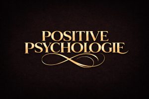 goldener Schriftzug: POSITIVE PSYCHOLOGIE auf schwarzem Untergrund