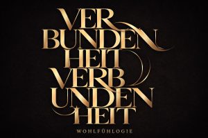 goldener Schriftzug VERBUNDENHEIT auf schwarzem Hintergrund