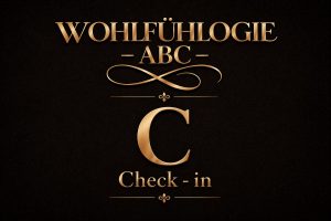 Goldenes Typografie-Bild mit dem Schriftzug Wohlfühlogie ABC – C Check-in auf dunklem Hintergrund als Symbol für inneres Gleichgewicht